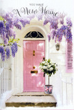 This scene shows a tranquil Peckham entryway that seems to pause in a moment of quiet celebration. Overhead, wisteria tumbles in lush strands, its blossoms a soft blend of lavender and pale purple, hanging like fragrant tassels that sway gently in the breeze. They frame a pale pink front door, painted in a soothing pastel that could easily belong to a lovingly restored home just off Bellenden Road or near the creative studios around Copeland Park. The door sits within whitewashed walls that glow softly with natural light, while a delicately painted pink shutter echoes the same hue, reinforcing the calm, cohesive palette. At the doorstep, a thoughtfully arranged bucket of flowers takes centre stage. The simple metal container, slightly rustic in feel, is filled to overflowing with white and creamy roses, each bloom lush and plush, their petals layered like folded silk. Delicate greenery peeks through the roses, adding contrast and a just-picked freshness, as though gathered from a nearby London garden. A tender pink ribbon circles the base of the bucket, its bow loose and elegant, pulling together the soft pinks of the door, shutter, and floral accents. The atmosphere feels like late spring in Peckham-calm, gently scented, with the sense that someone is about to cross this threshold for the first time as its new owner or tenant. The composition evokes those quiet, meaningful transitions in life, when a new set of keys, a pastel door, and a delivery of beautiful blooms combine to turn a simple entrance into a true feeling of home.